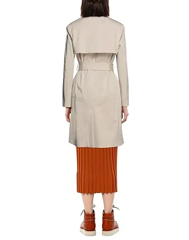 https://images.styletyx.com/images/beige-plain-weave-full-length-jacket-annie-p-13622874_3.webp