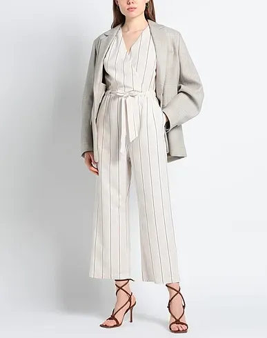 https://images.styletyx.com/images/beige-plain-weave-jumpsuit-one-piece-t-jacket-by-tonello-13400976_2.webp