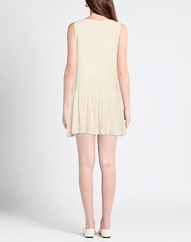 https://images.styletyx.com/images/beige-plain-weave-short-dress-empathie-13181203_3.webp