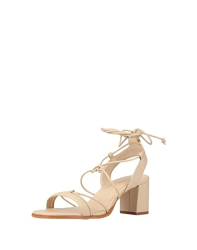 https://images.styletyx.com/images/beige-sandals-alohas-1703605_2.webp