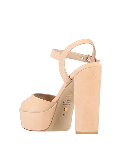 https://images.styletyx.com/images/beige-sandals-stuart-weitzman-2924209_3.webp