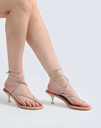 https://images.styletyx.com/images/beige-satin-flip-flops-3juin-13411821_2.webp