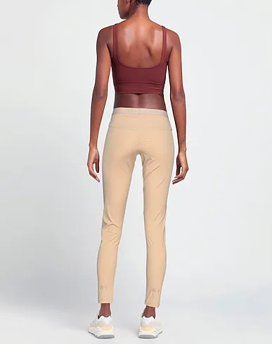 https://images.styletyx.com/images/beige-synthetic-fabric-leggings-gcds-2939119_3.webp