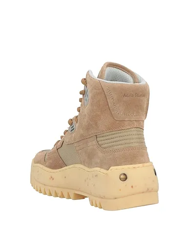 https://images.styletyx.com/images/beige-techno-fabric-ankle-boot-acne-studios-2976625_3.webp
