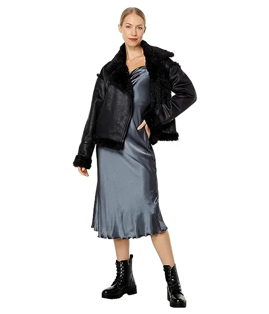 https://images.styletyx.com/images/berber-faux-down-cropped-puffer-jacket-nvlt-3039945_4.webp
