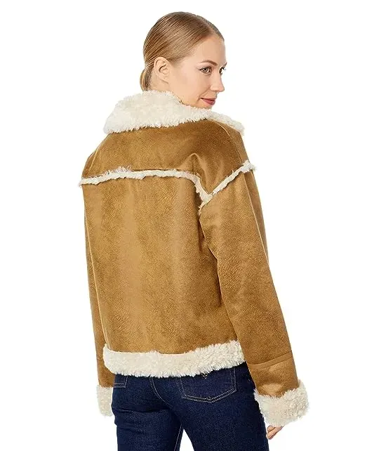 https://images.styletyx.com/images/berber-faux-down-cropped-puffer-jacket-nvlt-3039946_2.webp