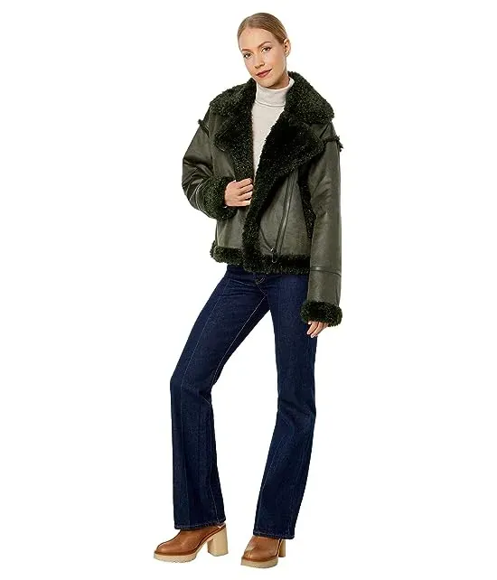 https://images.styletyx.com/images/berber-faux-down-cropped-puffer-jacket-nvlt-3087497_4.webp