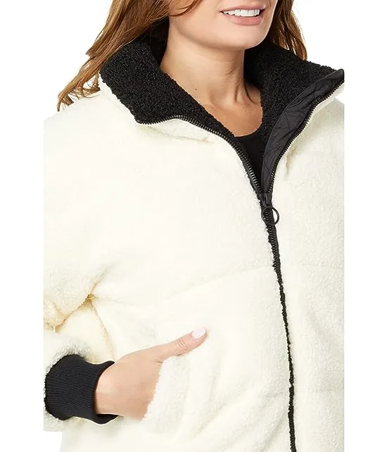 https://images.styletyx.com/images/berber-faux-down-cropped-puffer-jacket-nvlt-3128199_3.webp