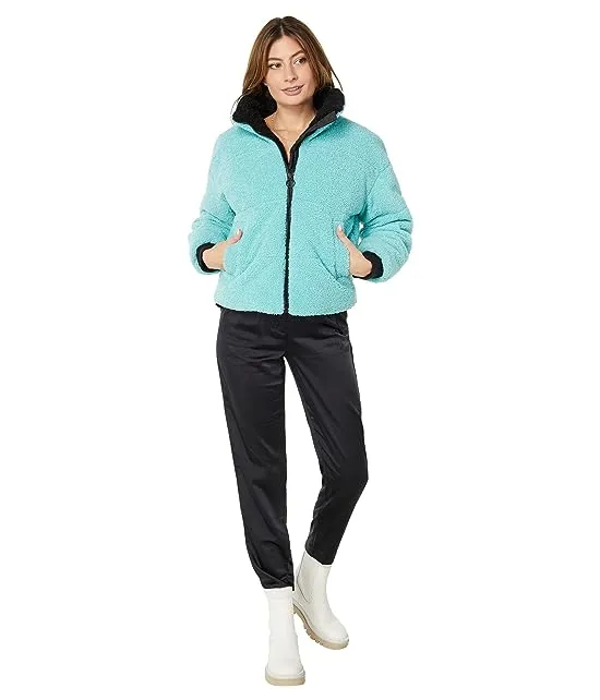 https://images.styletyx.com/images/berber-faux-down-cropped-puffer-jacket-nvlt-3151635_4.webp