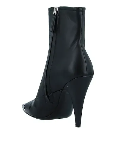 https://images.styletyx.com/images/black-ankle-boot-emilio-pucci-971372_3.webp