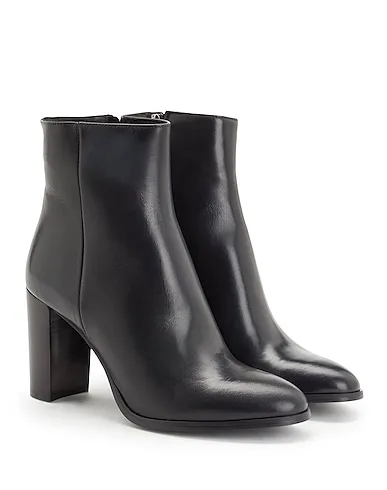 https://images.styletyx.com/images/black-ankle-boot-leather-heeled-ankle-boots-leonardo-principi-2432838_3.webp
