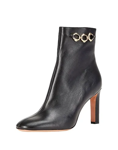 https://images.styletyx.com/images/black-ankle-boot-rama-nero-a-bocca-3067254_2.webp