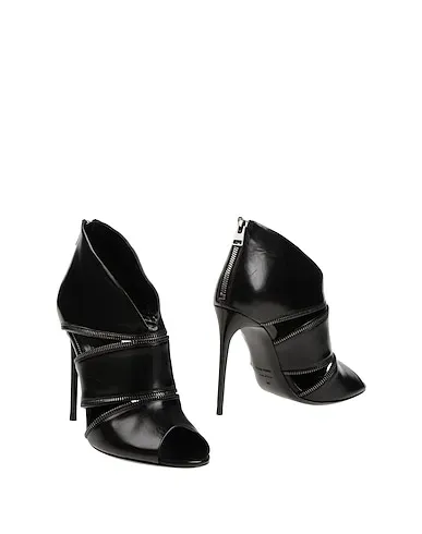 https://images.styletyx.com/images/black-ankle-boot-tom-ford-3113624_1.webp
