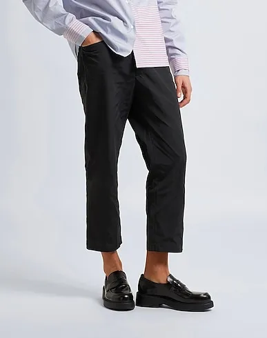 https://images.styletyx.com/images/black-casual-pants-jerry-oilskin-oficina-trouser-8-by-coco-capitan-13101660_2.webp