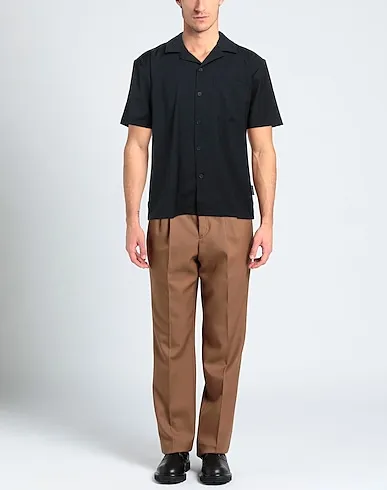 https://images.styletyx.com/images/black-cotton-twill-solid-color-shirt-han-kjobenhavn-3210543_2.webp