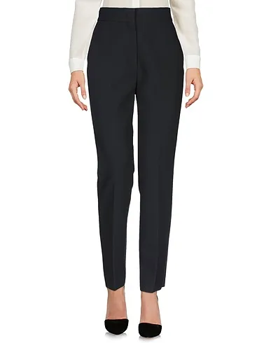 https://images.styletyx.com/images/black-crepe-casual-pants-msgm-726888_2.webp