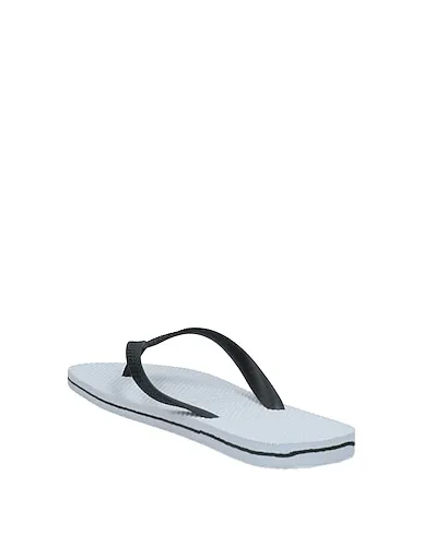 https://images.styletyx.com/images/black-flip-flops-philipp-plein-3258423_3.webp