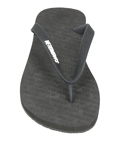https://images.styletyx.com/images/black-flip-flops-vetements-1007072774_4.webp
