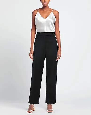 https://images.styletyx.com/images/black-gabardine-casual-pants-hache-1224818356_2.webp