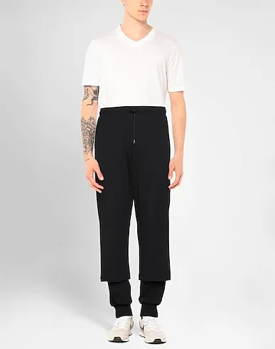 https://images.styletyx.com/images/black-jersey-casual-pants-424-fourtwofour-3060952_2.webp