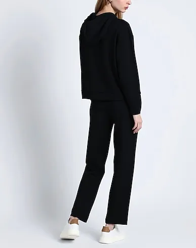 https://images.styletyx.com/images/black-jersey-casual-pants-hugo-boss-13155614_3.webp