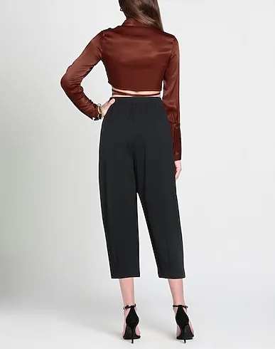 https://images.styletyx.com/images/black-jersey-casual-pants-mama-b-470720279_3.webp