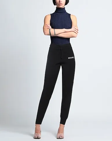 https://images.styletyx.com/images/black-jersey-casual-pants-marc-jacobs-13415149_2.webp