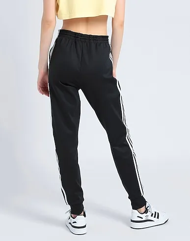 https://images.styletyx.com/images/black-jersey-casual-pants-sst-classic-tp-adidas-1274553920_3.webp