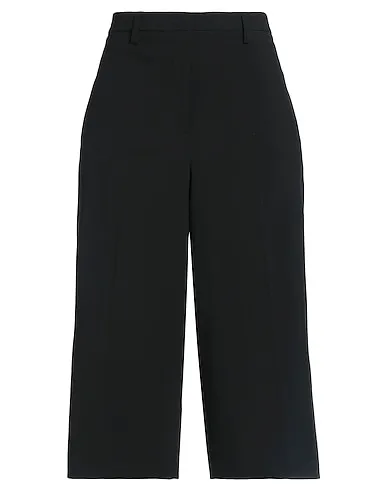 https://images.styletyx.com/images/black-jersey-cropped-pants-culottes-sa-rya-couture-1006807174_1.webp