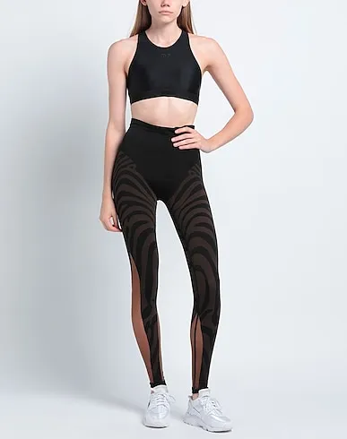 https://images.styletyx.com/images/black-jersey-leggings-gcds-1223640203_2.webp