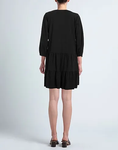 https://images.styletyx.com/images/black-jersey-short-dress-thinking-mu-13297052_3.webp