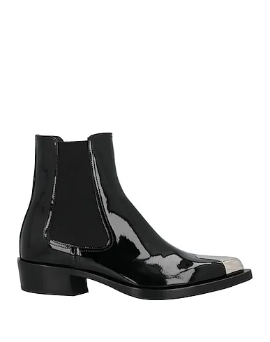https://images.styletyx.com/images/black-leather-ankle-boot-alexander-mcqueen-13413751_1.webp