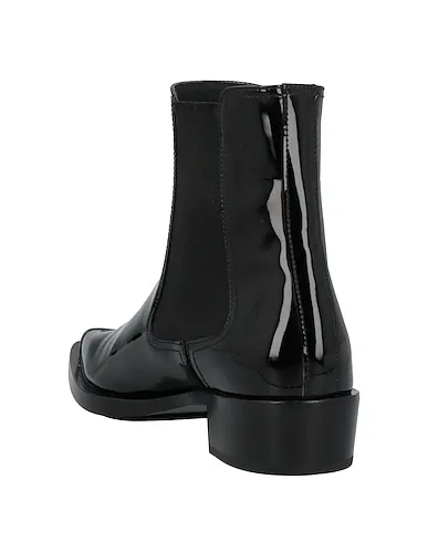 https://images.styletyx.com/images/black-leather-ankle-boot-alexander-mcqueen-13413751_3.webp