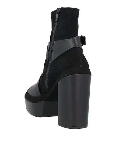 https://images.styletyx.com/images/black-leather-ankle-boot-clergerie-1223954103_3.webp