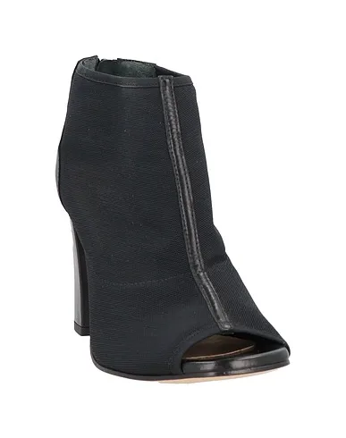 https://images.styletyx.com/images/black-leather-ankle-boot-couture-1004914505_2.webp
