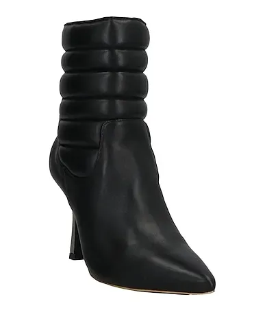 https://images.styletyx.com/images/black-leather-ankle-boot-gold-rouge-1906784850_2.webp
