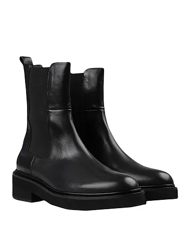 https://images.styletyx.com/images/black-leather-ankle-boot-jonak-2501079_4.webp