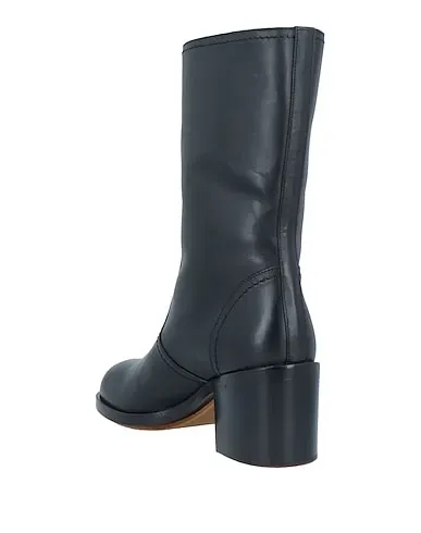 https://images.styletyx.com/images/black-leather-ankle-boot-laurence-dacade-1005138378_3.webp