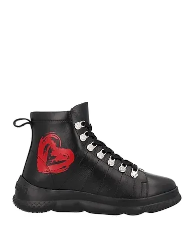 https://images.styletyx.com/images/black-leather-ankle-boot-love-moschino-1528612_1.webp
