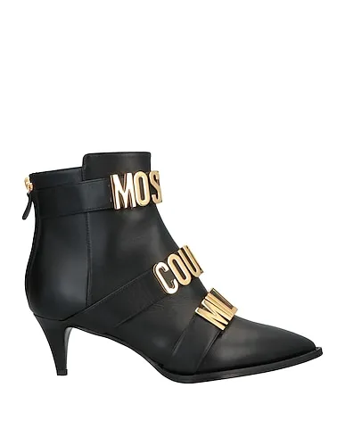 https://images.styletyx.com/images/black-leather-ankle-boot-love-moschino-890135_1.webp