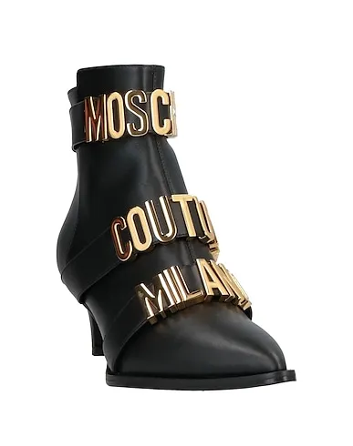 https://images.styletyx.com/images/black-leather-ankle-boot-love-moschino-890135_2.webp