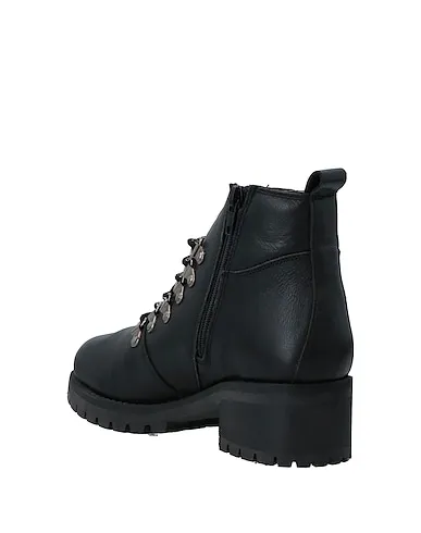 https://images.styletyx.com/images/black-leather-ankle-boot-pregunta-13154027_3.webp