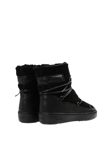 https://images.styletyx.com/images/black-leather-ankle-boot-pulse-low-shearling-moon-boot-1445524_2.webp