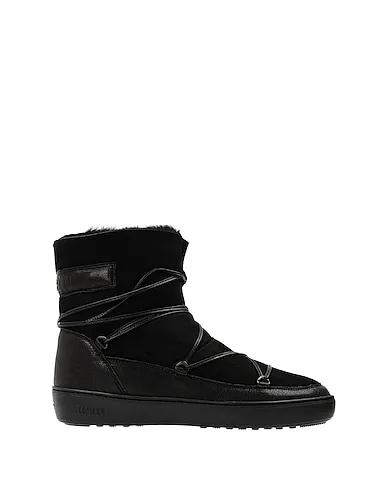 https://images.styletyx.com/images/black-leather-ankle-boot-pulse-low-shearling-moon-boot-1445524_3.webp