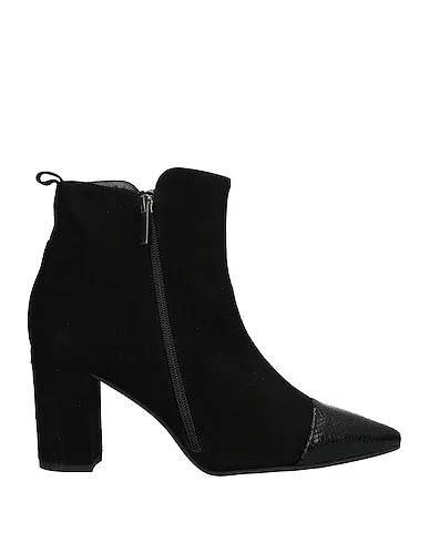 https://images.styletyx.com/images/black-leather-ankle-boot-tiqu-13376273_1.webp