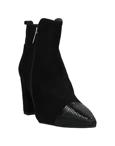 https://images.styletyx.com/images/black-leather-ankle-boot-tiqu-13376273_2.webp