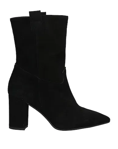 https://images.styletyx.com/images/black-leather-ankle-boot-tiqu-13407810_1.webp