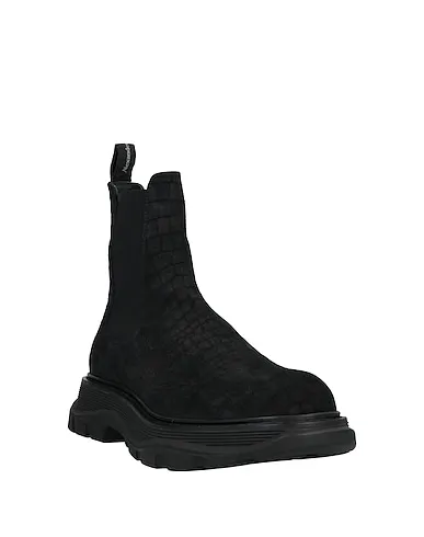 https://images.styletyx.com/images/black-leather-boots-alexander-mcqueen-13199792_2.webp