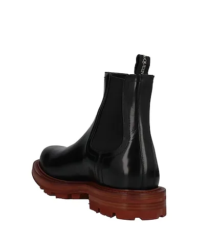 https://images.styletyx.com/images/black-leather-boots-alexander-mcqueen-3454807_3.webp