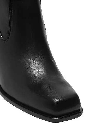 https://images.styletyx.com/images/black-leather-boots-altuzarra-1290782_2.webp